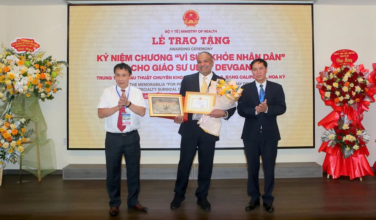 The For the People’s Health commemorative medal presented to Professor Uday Devgan